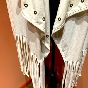Cream ultra suede loose fitting fringed jacket.